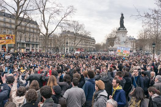 FRANCE, Paris: Hundreds of militants of the Nuit Debout or Standing night movement hold a general assembly to vote about the developments of the movement at the Place de la Republique in Paris on April 3, 2016. It has been four days that hundred of people have occupied the square to show, at first, their opposition to the labour reforms in the wake of the nationwide demonstration which took place on March 31, 2016. 