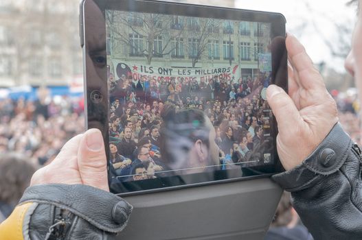 FRANCE, Paris: Hundreds of militants of the Nuit Debout or Standing night movement hold a general assembly to vote about the developments of the movement at the Place de la Republique in Paris on April 3, 2016. It has been four days that hundred of people have occupied the square to show, at first, their opposition to the labour reforms in the wake of the nationwide demonstration which took place on March 31, 2016. 