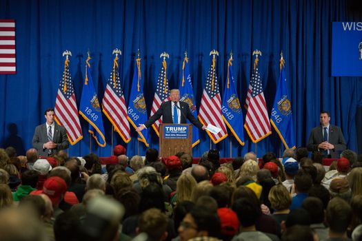 UNITED STATES, West Allis: Republican presidential candidate Donald Trump speaks to guests during a campaign stop at Nathan Hale High School on April 2, 2016 in West Allis, Wisconsin. Wisconsin voters go to the polls for the state's primary on April 5, 2016.