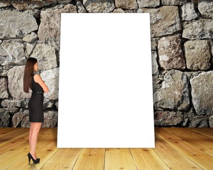 Big blank banner with businesswoman on grey wall background, side view