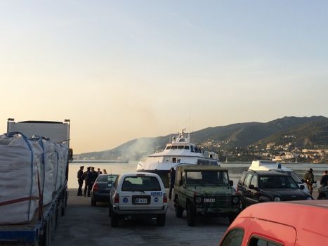 GREECE, Lesvos: A Turkish tourist boat with migrants in it leaves harbour in Lesbos, Greece on April 4, 2016 as Greece sent a first wave of migrants back to Turkey on April 4 under an EU deal that has faced heavy criticism from rights groups. Under the agreement, designed to halt the main influx which comes from Turkey, all irregular migrants arriving since March 20 face being sent back, although the deal calls for each case to be examined individually. For every Syrian refugee returned, another Syrian refugee will be resettled from Turkey to the EU, with numbers capped at 72,000.