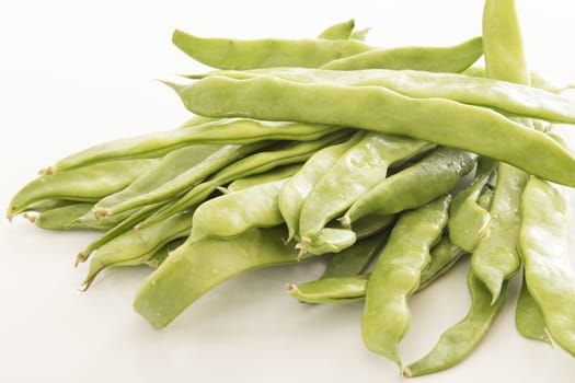 green beans on white background