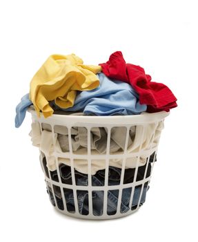 White basket full of clothes.