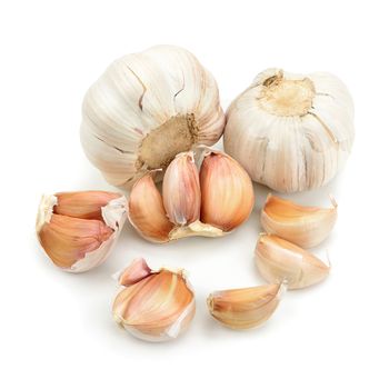 Cloves of garlic isolated on white background