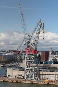 crane at the port on the background of the city Aerial view
