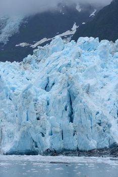 blue color of tidewater glacier in prince william sound in alaska