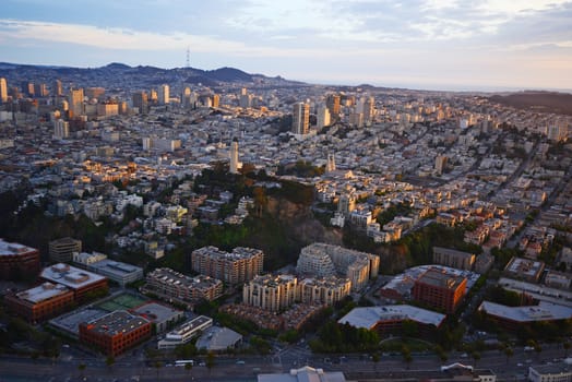 an aerial view of downtown san francisco with pier during sunset