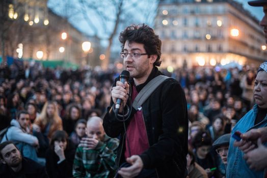 FRANCE, Paris: Hundreds of militants of the Nuit Debout or Standing night movement hold a general assembly to vote about the developments of the movement at the Place de la Republique in Paris on April 3, 2016. It has been four days that hundred of people have occupied the square to show, at first, their opposition to the labour reforms in the wake of the nationwide demonstration which took place on March 31, 2016.