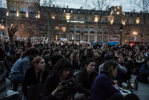 FRANCE, Paris: Hundreds of militants of the Nuit Debout or Standing night movement hold a general assembly to vote about the developments of the movement at the Place de la Republique in Paris on April 3, 2016. It has been four days that hundred of people have occupied the square to show, at first, their opposition to the labour reforms in the wake of the nationwide demonstration which took place on March 31, 2016.