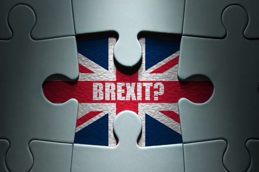 Missing piece from a jigsaw puzzle revealing the British flag and Brexit question