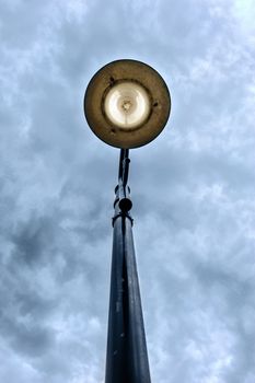 retro styled street light on dark twilight moody sky