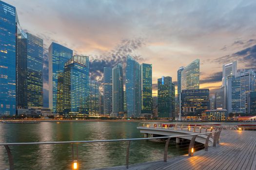 Singapore Central Business District city skyine by Marina Bay at sunset