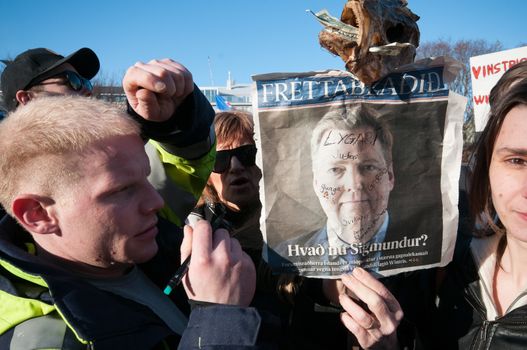 ICELAND, Reykjavik: Crowds gather outside Iceland's parliament demanding the Prime Minister step down over allegations he concealed investments in an offshore company in Reykjavik on April 4, 2016. Iceland's Prime Minister Sigmundur Gunnlaugsson earlier refused to resign after details about Wintris, an offshore firm used to allegedly hide million-dollar investments which he owned with his wife, were made public in Panama Papers massive data leak.