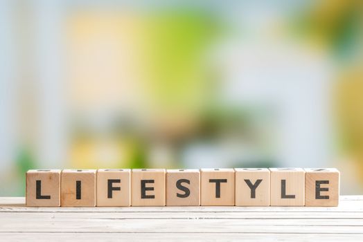 Lifestyle sign with cubes on a wooden table