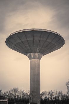 Water tower in Denmark in dark cloudy weather