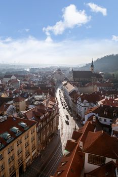 PRAGUE, CZECH REPUBLIC - DECEMBER 31, 2015 : General top view of Prague cityscape view with historical gothic buildings around, on cloudy sky background.