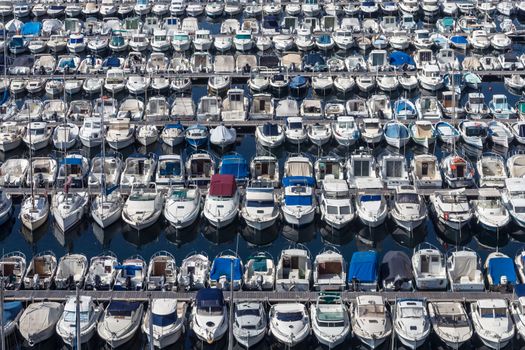 Boats lined up on the dock of the old port of Marseille, France