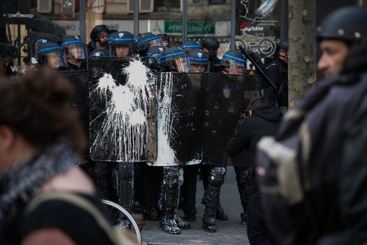 FRANCE, Paris: Clashes erupt between riot policemen and protesters in Paris on April 5, 2016 as pupils, students and unionists demonstrate against government's planned labour reforms.