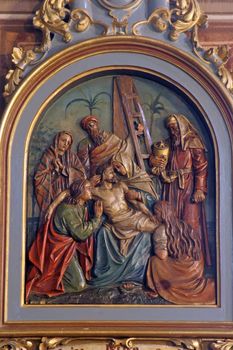 13th Stations of the Cross, Jesus' body is removed from the cross