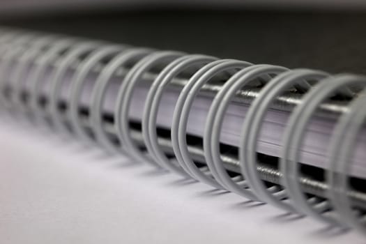 Extreme closeup of a spiral notebook