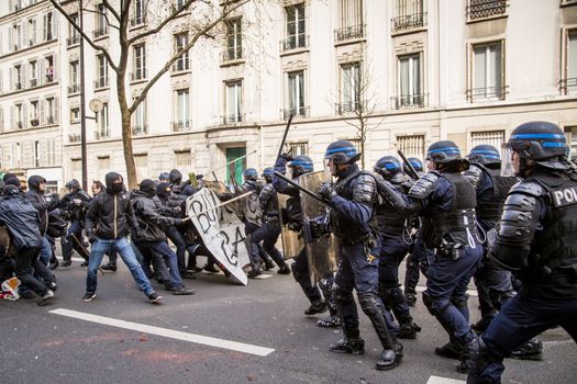 FRANCE, Paris: Clashes erupt between antiriot policemen and protesters in Paris on April 5, 2016 as high school students demonstrate against government's planned labour law reforms for the fifth day.