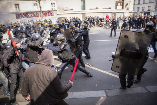 FRANCE, Paris: Clashes erupt between antiriot policemen and protesters in Paris on April 5, 2016 as high school students demonstrate against government's planned labour law reforms for the fifth day.