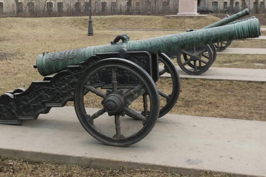 old medieval bronze cannon on the gun carriage 