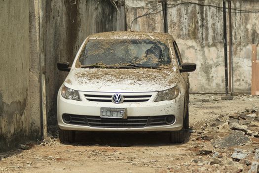 BRAZIL, Rio de Janeiro: Debris from a building explosion covers a car in Rio de Janeiro, Brazil on April 5, 2016.Five  people were killed and nine injured in the explosion. The fire department responded to the blast in the Coelho Neto neighborhood. Neighbors reported the smell of gas leaks for over a year, however the fire department declined to comment on what may have caused the explosion. 