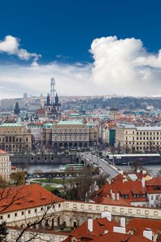 PRAGUE, CZECH REPUBLIC - DECEMBER 30 : Top cityscape view of Prague with historical gothic architecture, on cludy blue sky bakcground.