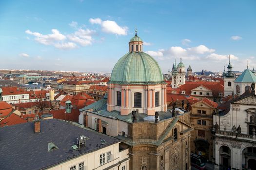 PRAGUE, CZECH REPUBLIC - DECEMBER 31, 2015 : Historical gothic cityscape view from Old Town Bridge Tower in Prague, on cloudy sky background.