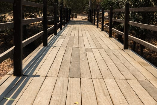 old wooden bridge in  deep forest, natural vintage background