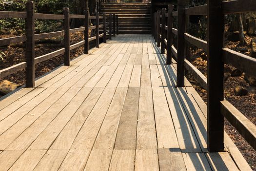 old wooden bridge in  deep forest, natural vintage background