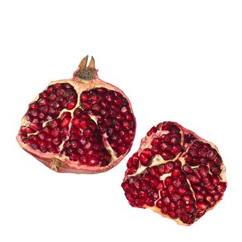 Two halves of juicy ripe pomegranate isolated on a white background.