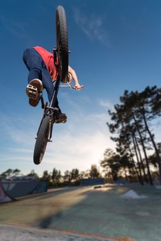 High BMX jump in a skate park.