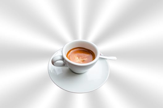 Cup of coffee on abstract silver star-shaped background.
Intentional blur. Focus on the center of the cup.