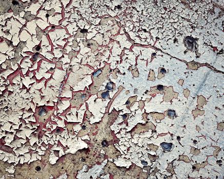 abstract background or texture peeled colored paint on a concrete wall