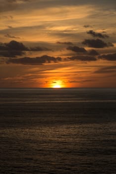 orange red sunset in portugal in atlantic ocean