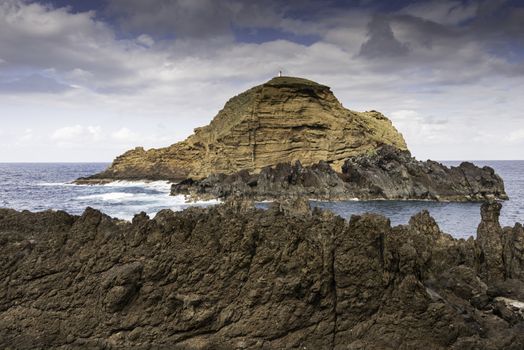 Big lava rock at the north coast of Madeira portuguese island in the atlantic ocean