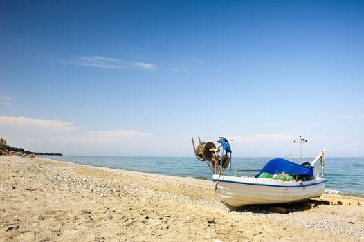 Fisher boats at the beach of Aegean sea, Greece