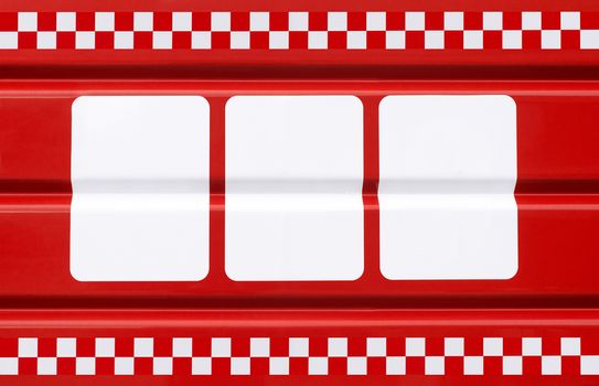 red metal plate with three white rectangles for symbols, emergency, public transportation  services