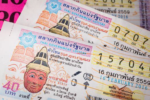 BANGKOK, THAILAND - FEBRUARY 10, 2015: Lottery ticket sold on corrugated plastic board, in the markets of Bangkok in Thailand, on February 10, 2015