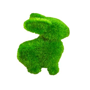 Little green rabbit on wooden floor, made from artificial grass isolated on white background