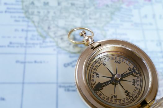 Compass on map background, use for travel concept
