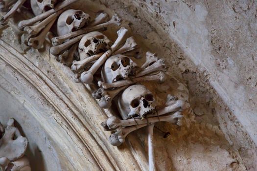 Close up detailed view of Sedlec Ossuary, Church of Bones in Kutna Hora, decorated with real human skeleton bones.