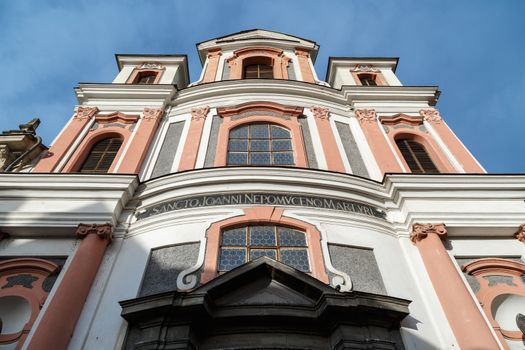 KUTNA HORA, CZECH REPUBLIC - DECEMBER 28, 2015 : Close up bottom view of historical baroque building in Kutna Hora, on cloudy blue sky backgorund.