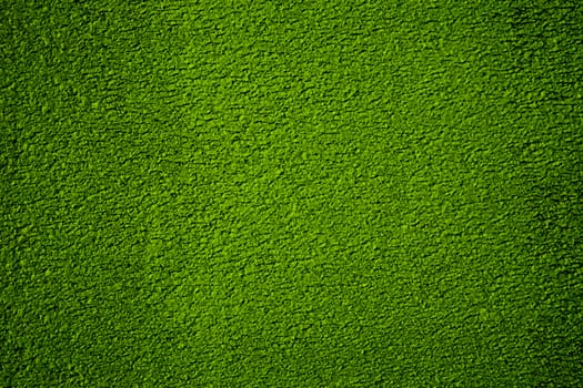 Green wall background.