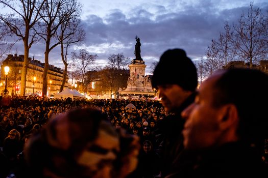 FRANCE, Paris: Thousand militants of the Nuit debout (Standing night) movement gather on April 7, 2016 at the Place de la Republique in Paris, as participants plan to spend the night camped out to protest against the government's planned labour reform and against forced evictions. It has been one week that hundred of people have occupied the square to show, at first, their opposition to the labour reforms in the wake of the nationwide demonstration which took place on March 31, 2016.