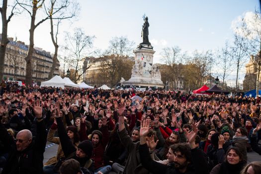 FRANCE, Paris: Militants of the Nuit debout (Standing night) movement gather on April 7, 2016 at the Place de la Republique in Paris, as participants plan to spend the night camped out to protest against the government's planned labour reform and against forced evictions. It has been one week that hundred of people have occupied the square to show, at first, their opposition to the labour reforms in the wake of the nationwide demonstration which took place on March 31, 2016.