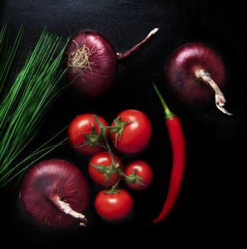 mix of different vegetables on a dark background