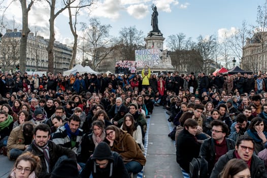 FRANCE, Paris: Thousand militants of the Nuit debout (Standing night) movement gather on April 7, 2016 at the Place de la Republique in Paris, as participants plan to spend the night camped out to protest against the government's planned labour reform and against forced evictions. It has been one week that hundred of people have occupied the square to show, at first, their opposition to the labour reforms in the wake of the nationwide demonstration which took place on March 31, 2016.